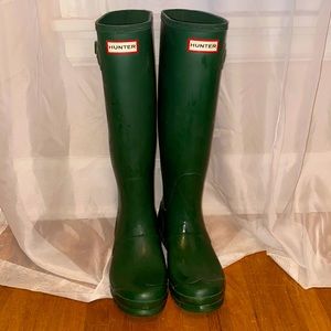 Green hunter boots.  Tall & gently used